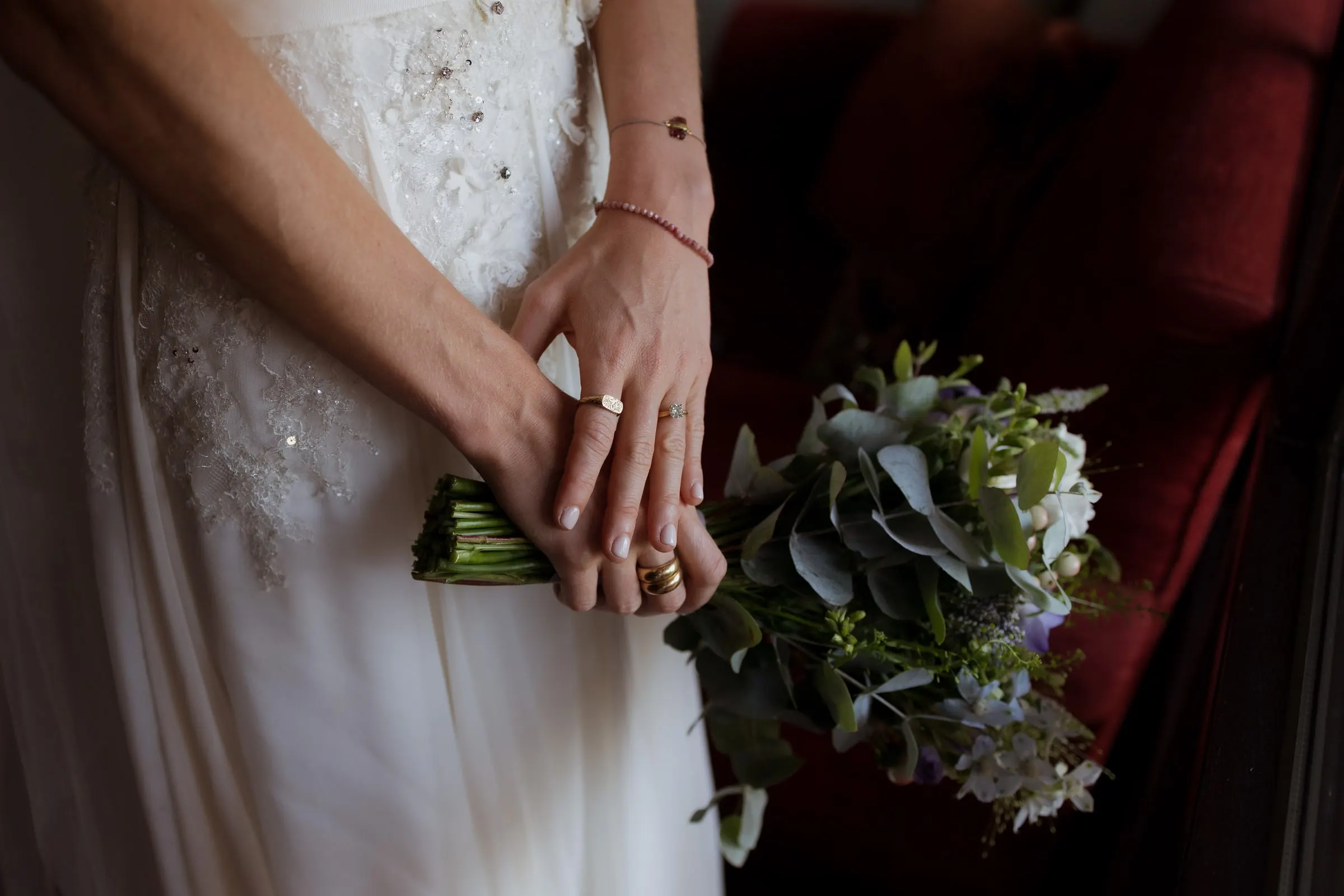 Bride's hands with gold rings holding a bouquet of wild flowers, Barbillón, Marbella