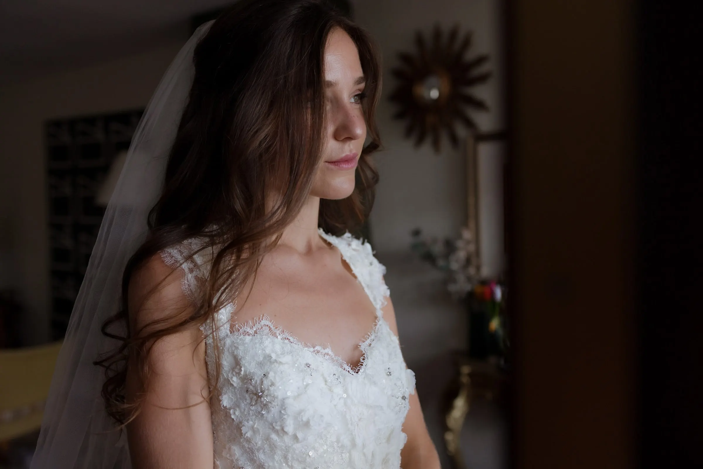 Bride in her veil looking down with a soft expression, Barbillón, Marbella