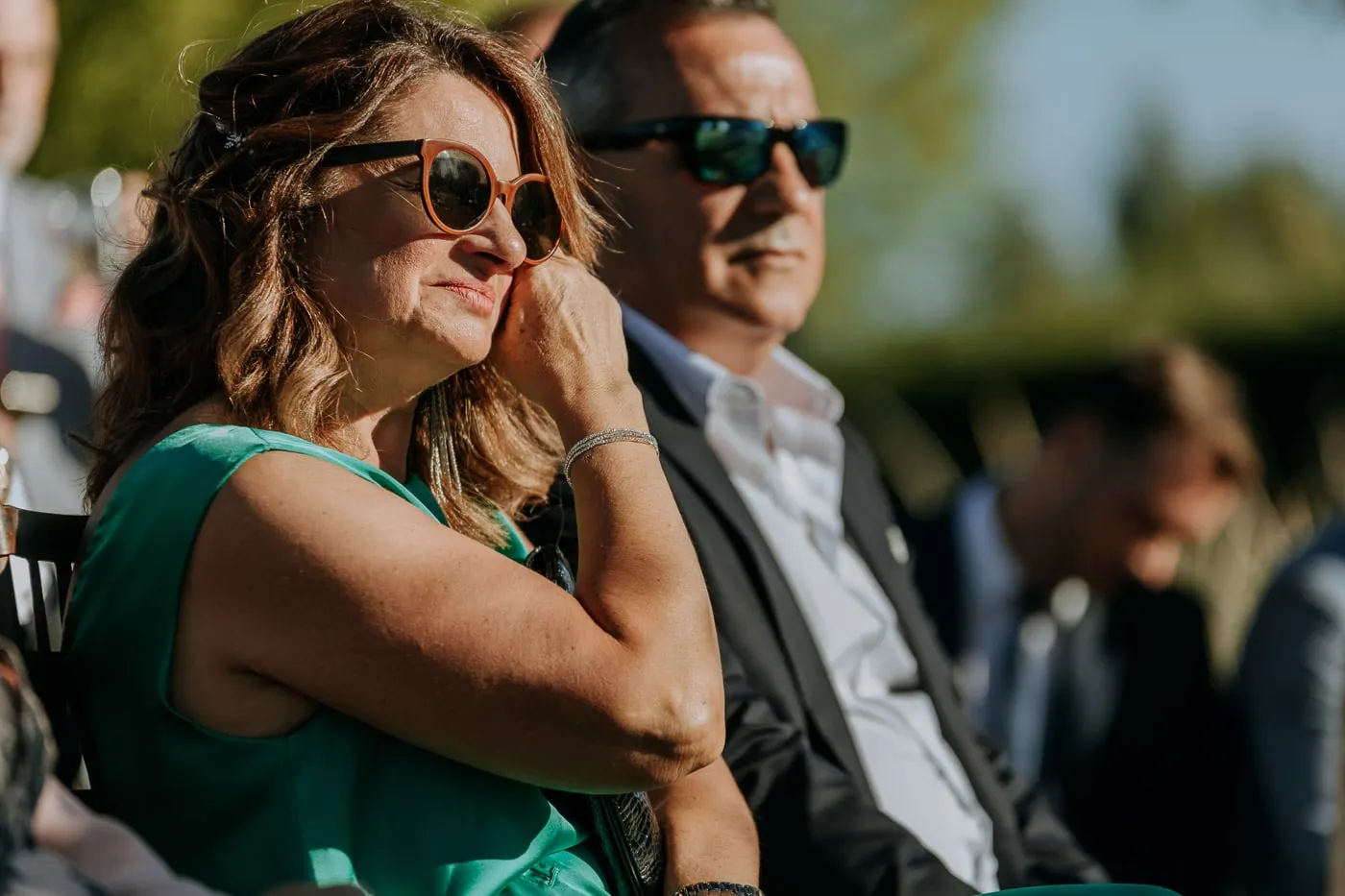 Guest wiping away a tear during the ceremony, Castillo del Buen Amor