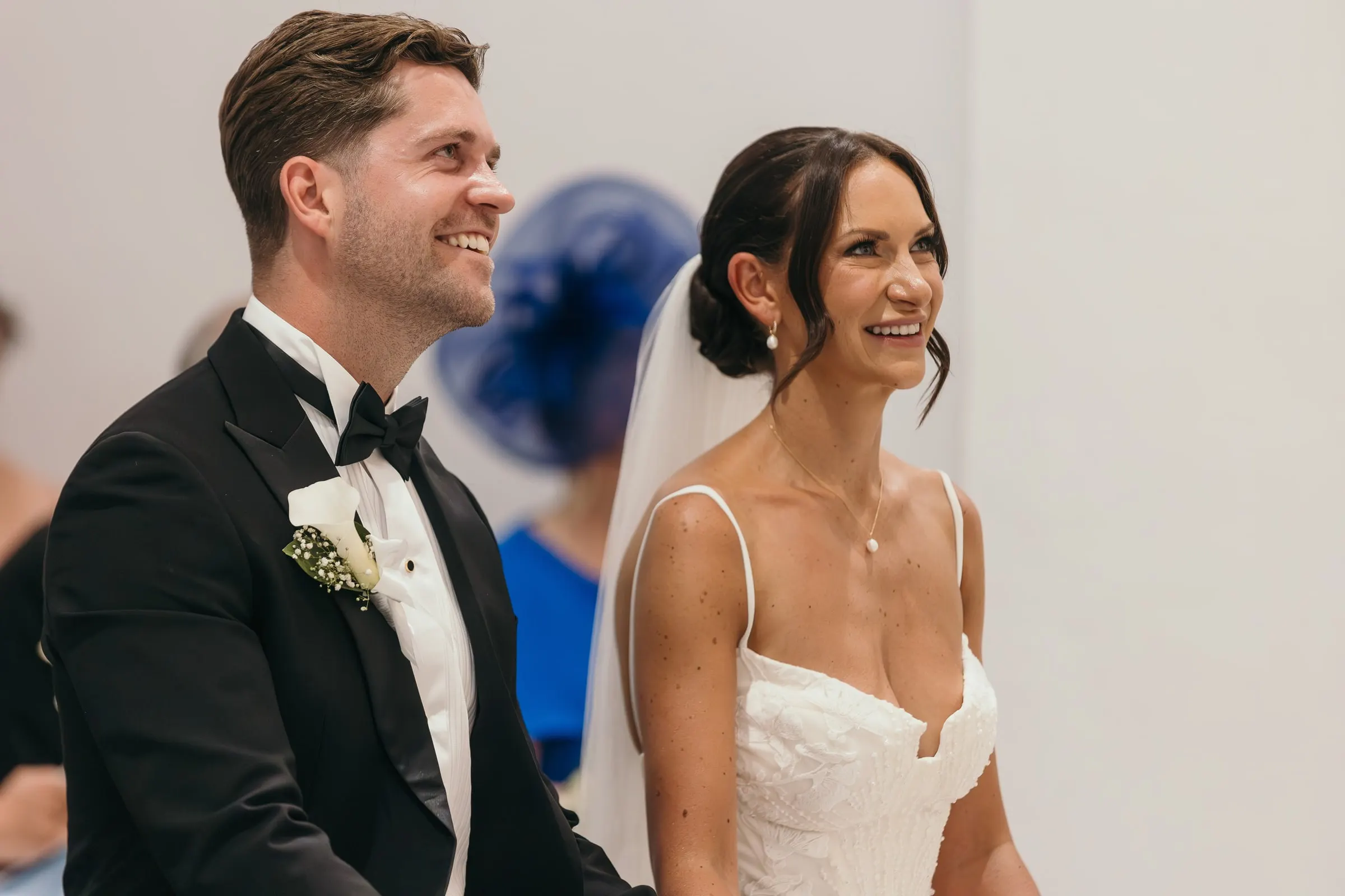Couple laughing during the church ceremony in Mijas Pueblo
