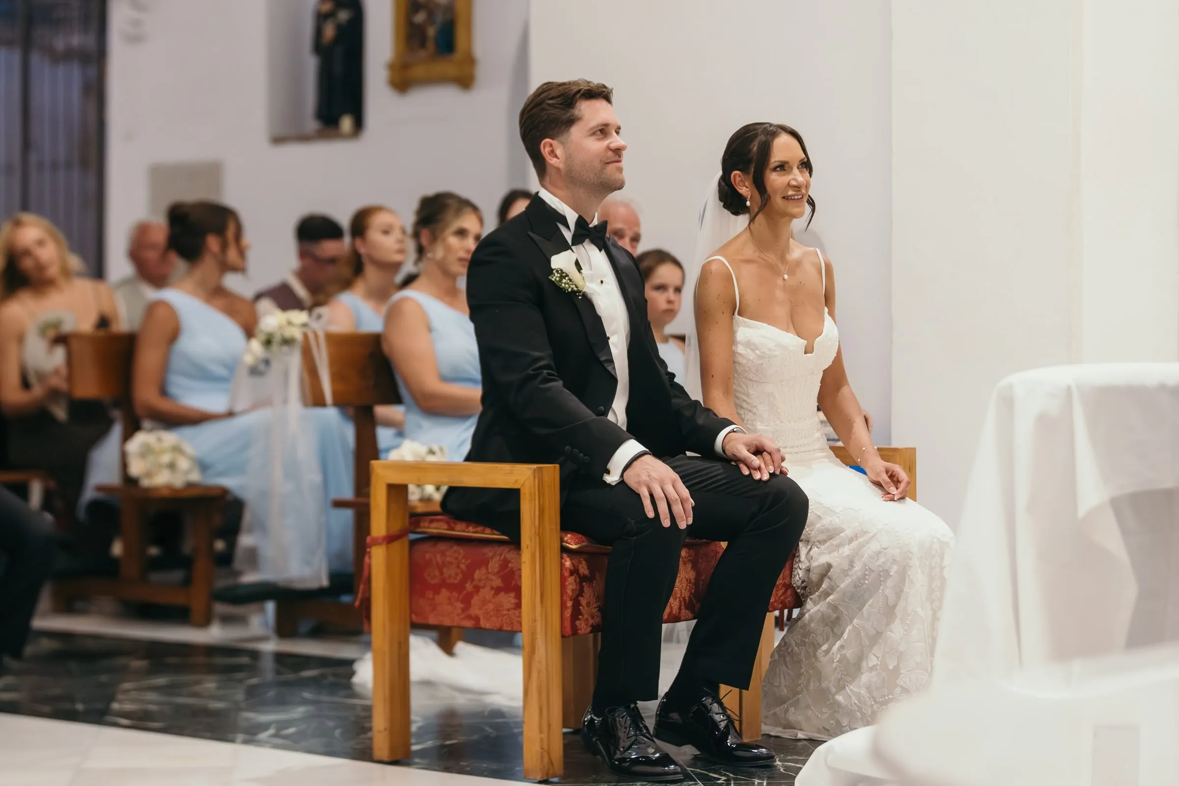 Guests in the pews watching the ceremony, church in Mijas Pueblo
