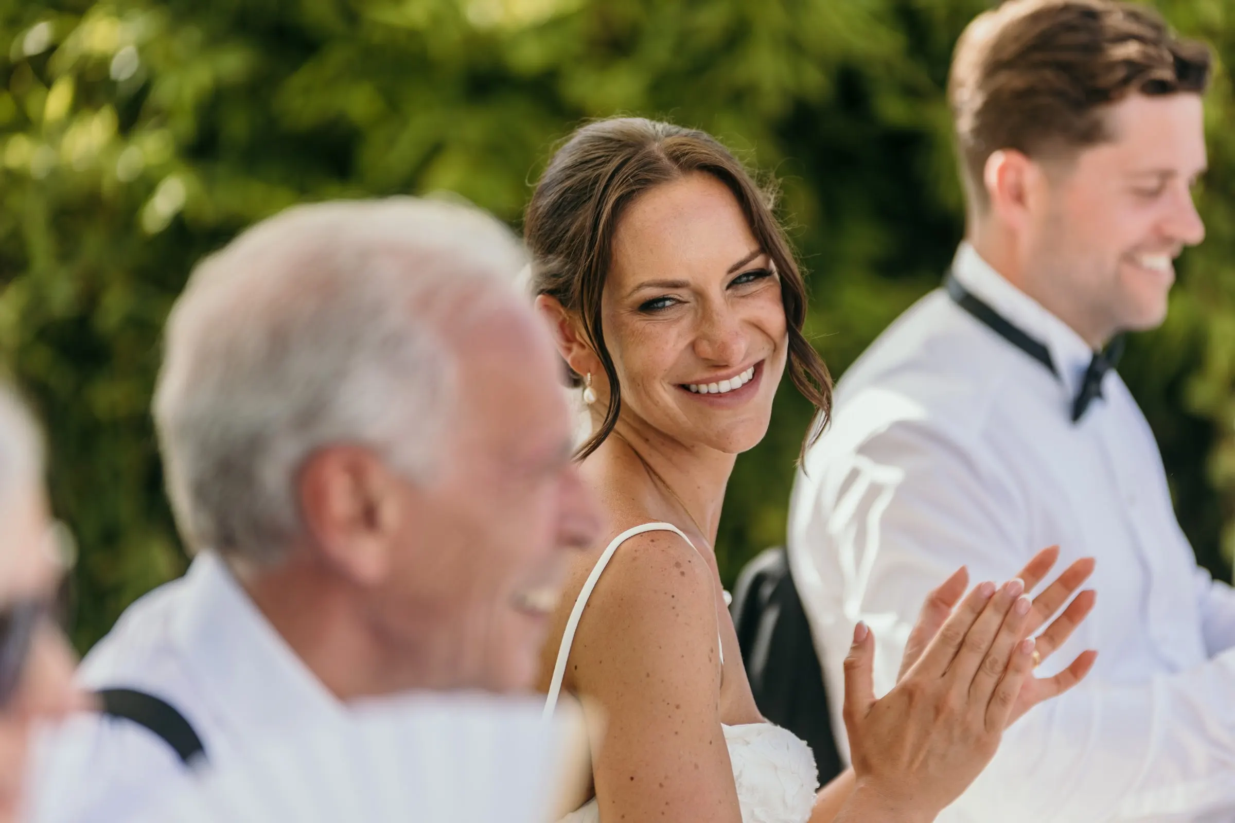Bride smiling during the wedding speeches in Mijas